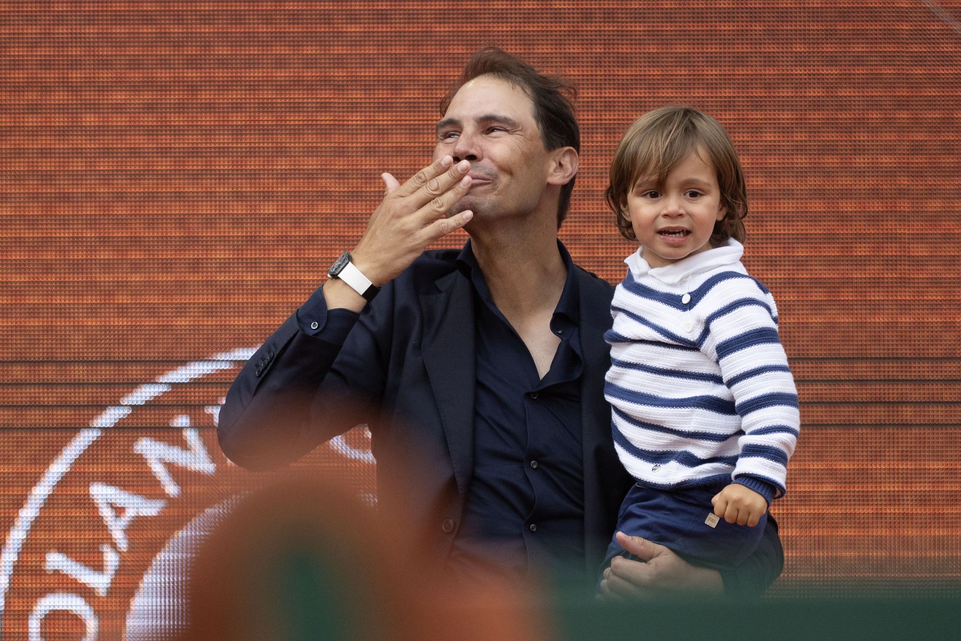 Rafael Nadal with son Rafa Jr. at the French Open farewell ceremony - Image Source: Getty